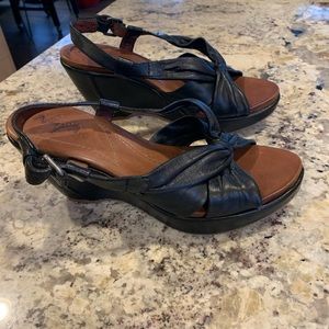 Naya black leather wedge